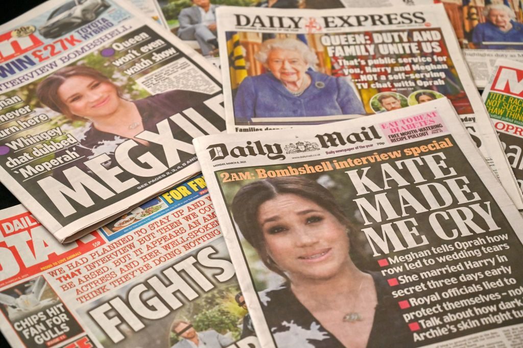 A selection of UK daily newspapers shows front page headlines on the story of the interview given by Meghan, Duchess of Sussex, wife of Britain's Prince Harry, Duke of Sussex, to Oprah Winfrey. (BEN STANSALL/AFP via Getty)