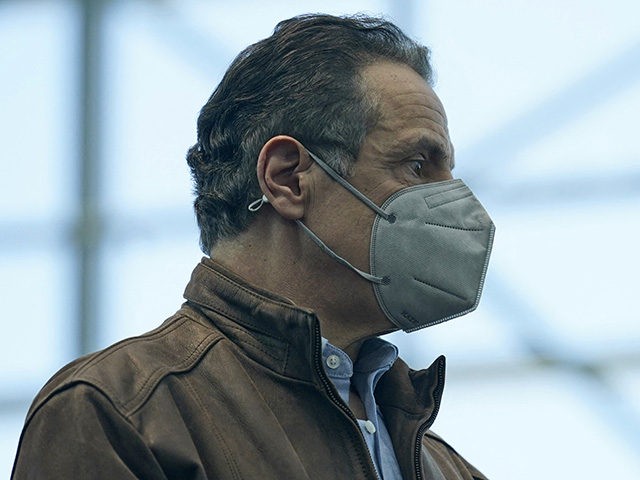 New York Governor Andrew Cuomo listens to speakers at a vaccination site on March 8, 2021,