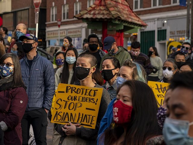 SEATTLE, WA - MARCH 13: Demonstrators gather in the Chinatown-International District for a
