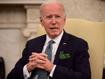 US President Joe Biden speaks on the shooting incident in Atlanta before taking part in a virtual bilateral meeting with Irish Prime Minister Micheál Martin in the Oval Office at the White House on March 17, 2021 in Washington,DC. (Photo by JIM WATSON / AFP) (Photo by JIM WATSON/AFP via …