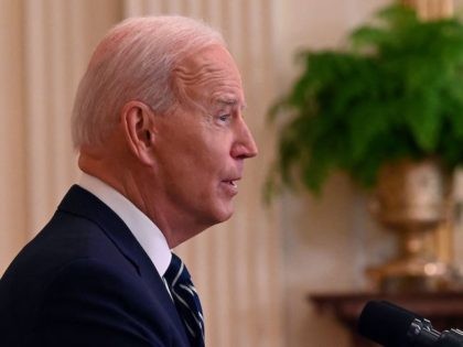 US President Joe Biden answers a question during his first press briefing in the East Room of the White House in Washington, DC, on March 25, 2021. (Jim Watson/AFP via Getty Images)