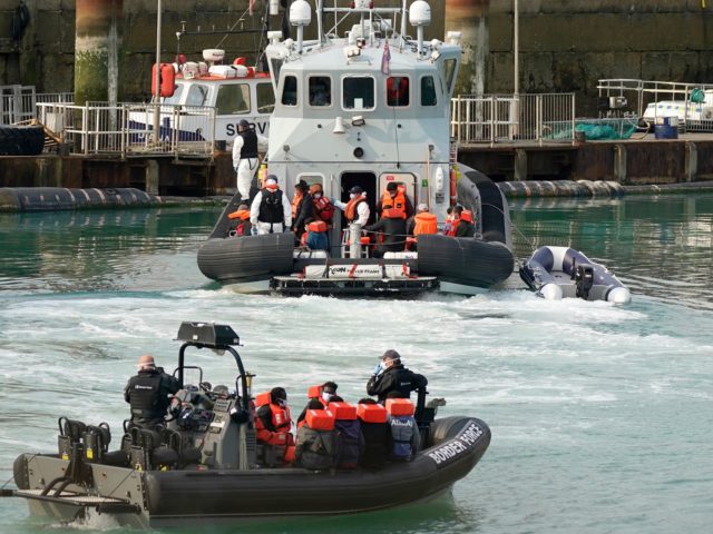 DOVER, ENGLAND - SEPTEMBER 11: Migrants arrive at Dover Marina after being rescued in the English Channel by the Border Force on September 11, 2020 in Dover, England. More than 1,468 migrants, some of them children, crossed the English Channel by small boat in August, despite a commitment from British …
