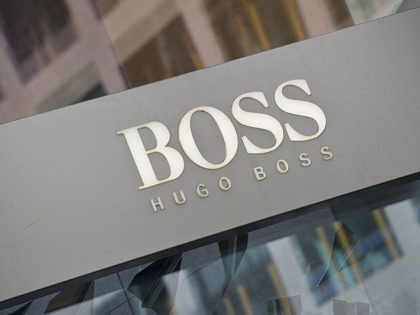 View of German clothing designer Hugo Boss' logo at an outlet in Berlin September 28, 2011. Hugo Boss is accused of being "part of the Nazi regime" in a forthcoming historical report by historian Joachim Scholtyseck. AFP PHOTO / JOHN MACDOUGALL (Photo credit should read JOHN MACDOUGALL/AFP via Getty Images)