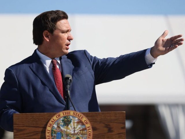 MIAMI GARDENS, FLORIDA - JANUARY 06: Florida Governor Ron DeSantis speaks during a press conference about the opening of a COVID-19 vaccination site at the Hard Rock Stadium on January 06, 2021 in Miami Gardens, Florida. The governor announced that the stadium's parking lot which offers COVID-19 tests will begin …