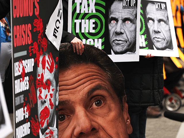 People gather outside Gov. Andrew Cuomo's NYC office to protest against cuts to health care on March 01, 2021 in New York City. On the one-year anniversary of the first coronavirus (COVID-19) diagnosis in NYC, grassroots organizations gathered as part of the “Invest In Our NY campaign!” demanding Gov. Cuomo …
