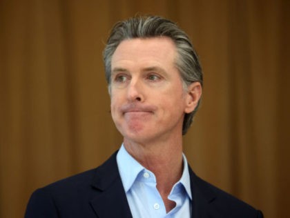 ALAMEDA, CALIFORNIA - MARCH 16: California Gov. Gavin Newsom looks on during a news conference after he toured the newly reopened Ruby Bridges Elementary School on March 16, 2021 in Alameda, California. Gov. Newsom is traveling throughout California to highlight the state's efforts to reopen schools and businesses as he …