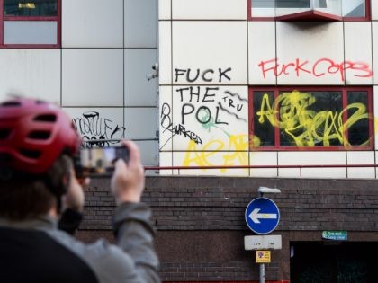 BRISTOL, ENGLAND - MARCH 22: (EDITORS NOTE: IMAGE CONTAINS PROFANITY) Graffiti is seen on the outside of Bridewell Police station on March 22, 2021 in Bristol, England. Protests in Bristol on Saturday at the "Kill the Bill" demonstration turned violent as protestors clashed with police. Crowds had gathered for the …
