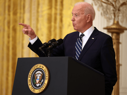 U.S. President Joe Biden talks to reporters during the first news conference of his presidency in the East Room of the White House on March 25, 2021 in Washington, DC. On the 64th day of his administration, Biden, 78, faced questions about the coronavirus pandemic, immigration, gun control and other …