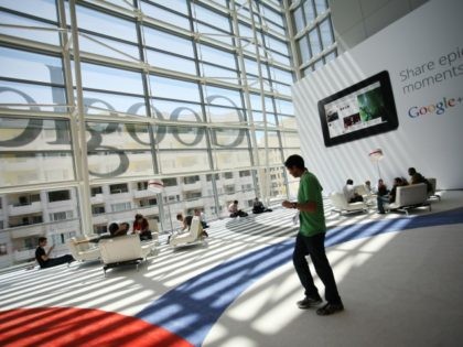 A Google logo is seen through windows of Moscone Center in San Francisco during Google's annual developer conference, Google I/O, in San Francisco on June 28, 2012 in California. AFP PHOTO / Kimihiro Hoshino (Photo credit should read KIMIHIRO HOSHINO/AFP/GettyImages)