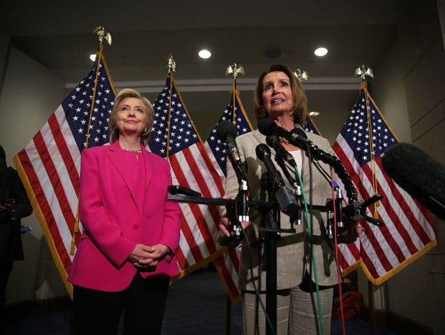 WASHINGTON, DC - JULY 14: Democratic US presidential hopeful and former US Secretary of State Hillary Clinton (L) and House Minority Leader Rep.  Nancy Pelosi (D-CA) (R) speaking with members of the media July 14, 2015 on Capitol Hill in Washington, DC.  Clinton is visiting the Hill today and she had a meeting with the House Democratic Caucus earlier in the morning.  (Photo by Alex Wong/Getty Images)