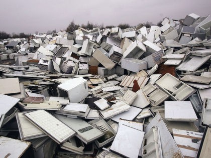 MANCHESTER, ENGLAND - NOVEMBER 24: A mountain of discarded fridges are shown at a fridge d