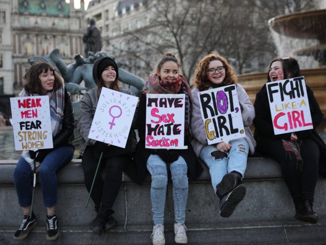 LONDON, ENGLAND - JANUARY 21: Protesters take part in the Women's March on January 21, 2017 in London, England. The Women's March originated in Washington DC but soon spread to be a global march, calling on all concerned citizens to stand up for equality, diversity and inclusion and for women's …