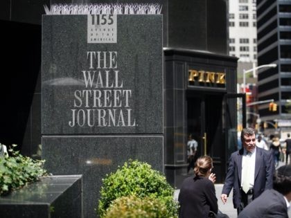 NEW YORK - May 01: Pedestrians walk past the Wall Street Journal building at 1155 6th Avenue on May 01, 2007 in New York City. Today the News Corporation made an unsolicited $5 billion bid for The Wall Street Journal. (Photograph by Michael Nagle/Getty Images)