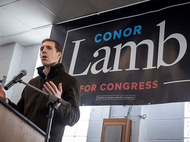 Conor Lamb, Democratic Congressional candidate for Pennsylvania's 18th district, speaks at a campaign rally with United Mine Workers of America (UMWA) at the Greene County Fairgrounds, March 11, 2018 in Waynesburg, Pennsylvania. Lamb is running in a tight race for the vacated seat of Congressman Tim Murphy against Republican candidate …