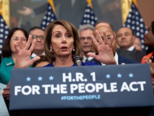 US Speaker of the House Nancy Pelosi (C), Democrat of California, speaks alongside Democratic members of the House about H.R.1, the "For the People Act," at the US Capitol in Washington, DC, January 4, 2019. - Democrats announced their first piece of legislation to reform voting rights provisions, ethics reforms …