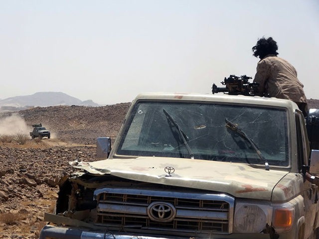 Forces loyal to Yemen's Saudi-backed government get into position during clashes with Huthi rebel fighters in Yemen's northeastern province of Marib on March 4, 2021. (Photo by - / AFP) (Photo by -/AFP via Getty Images)