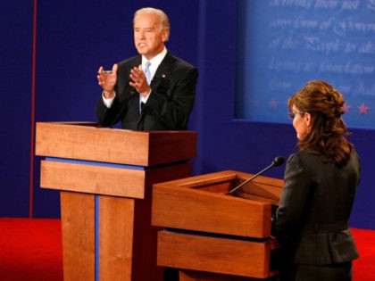 ST. LOUIS - OCTOBER 02: Democratic vice presidential candidate U.S. Senator Joe Biden (D-DE) speaks as Republican vice presidential candidate Alaska Gov. Sarah Palin (R) looks on during the vice presidential debate at the Field House of Washington University's Athletic Complex on October 2, 2008 in St. Louis, Missouri. The …