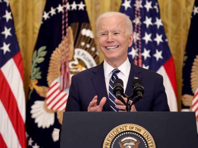 U.S. President Joe Biden answers questions during the first news conference of his preside