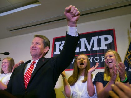 Brian Kemp addresses the audience and declares victory during an election watch party on July 24, 2018 in Athens, Georgia. Kemp defeated opponent Casey Cagle in a runoff election for the Republican nomination for the Georgia Governor's race. (Jessica McGowan/Getty Images)