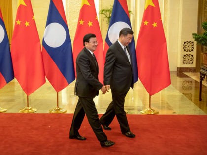 BEIJING, CHINA JANUARY 6: Laos Prime Minister Thongloun Sisoulith, left, and Chinese Presi