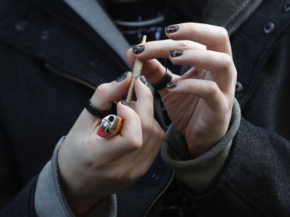 BROOKLYN, NEW YORK - APRIL 14: A recreational marijuana smoker indulges in smoking weed on
