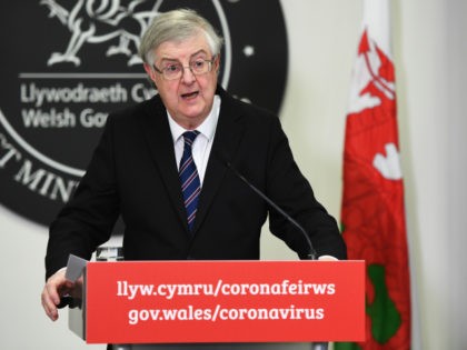 CARDIFF, WALES - MARCH 12: Mark Drakeford, the Welsh First Minister talks at a Welsh government Covid-19 briefing on March 12, 2021 in Cardiff, Wales. The Welsh First Minister, newly released from self-isolation, will lift the “stay at home” requirement in Wales from Saturday, March 13 and replace it with …