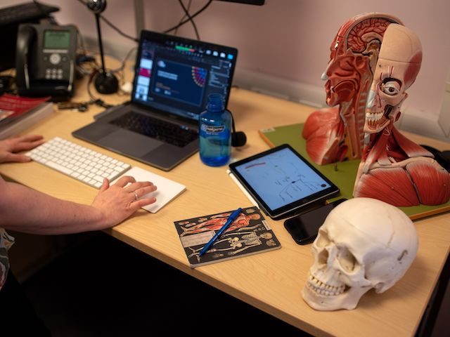 Senior Lecturer in Clinical Anatomy at the Hull York Medical School, Dr Kat Sanders prepares a remote learning session for her students from her office on the university campus in Hull, northern England on March 5, 2021. (Oli Scarff/AFP via Getty Images)