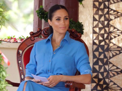 TUPOU COLLEGE TOLOA, TONGA - OCTOBER 26: Meghan, Duchess of Sussex talks with students dur