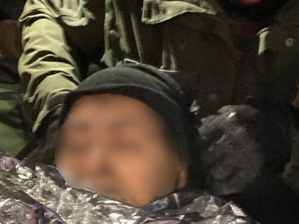 Laredo North Station agents rescue a Salvadoran migrant woman who suffered from hypothermia after crossing the border from Mexico into Texas in near-freezing conditions on February 20. (Photo: U.S. Border Patrol/Laredo Sector)