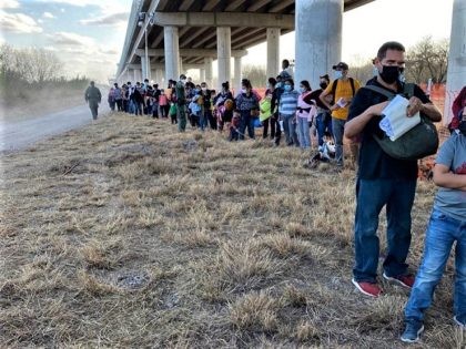 Border Patrol agents in South Texas apprehend a large group of migrants near Mission, Texas, in February. (Photo: U.S. Border Patrol/Rio Grande Valley Sector)