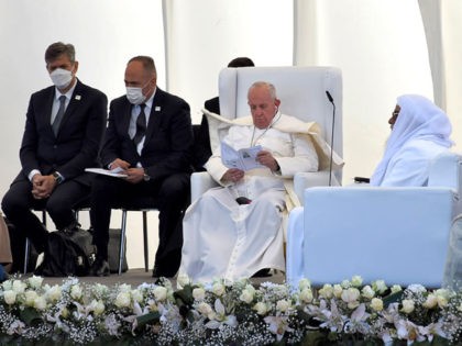Sayyid Jawad al-Khoei (L) listens as Pope Francis (2nd-R) speaks at the House of Abraham in the ancient city of Ur in southern Iraq's Dhi Qar province, on March 6, 2021, ahead of Pope Francis's visit to the archaeological site. - Pope Francis' March 5-8 visit, the first ever by …