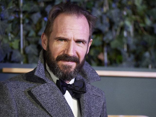 British actor Ralph Fiennes poses on the red carpet as he arrives to attend the 61st Londo