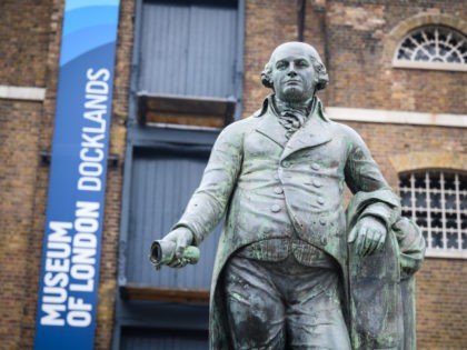 LONDON, ENGLAND - JUNE 08: A statue of Robert Milligan is seen outside the Museum of London Docklands on June 08, 2020 in London, England. Robert Milligan was a noted West Indian merchant, slaveholder and founder of London's global trade hub, West India Docks. Outside the Houses of Parliament, the …