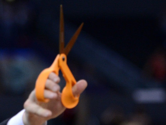 In this file photo, Head coach Gregg Marshall of the Wichita State Shockers holds up a pai