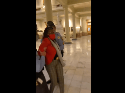 Here’s part of the video, from @hannahjoyTV , showing Democratic Rep. Park Cannon being detained by Georgia State Patrol outside an entrance to the Governor’s office. #gapol