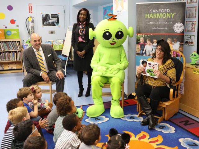Brooklyn kindergarten teacher Nicole Lopez of P.S. 282 does a class lesson after receiving a $10,000 award as an inaugural recipient of the National University System- Sanford Teacher Award, surrounded by National University System Chancellor Dr. Michael R. Cunningham and Assistant Principal Katerina Sidbury, on Tuesday, Oct. 23, 2018, in …