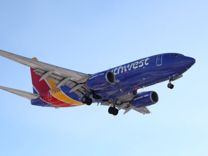 CHICAGO, ILLINOIS - JANUARY 28: A Southwest Airlines jet lands at Midway International Airport on January 28, 2021 in Chicago, Illinois. Southwest Airlines today reported its first annual loss since 1972. The coronavirus (COVID-19) pandemic has wreaked havoc on the industry in 2020 with U.S. airlines reporting a combined $34 …