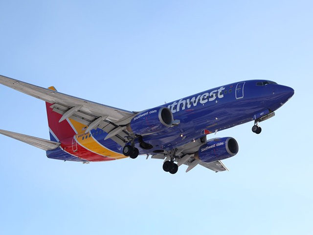 CHICAGO, ILLINOIS - JANUARY 28: A Southwest Airlines jet lands at Midway International Air