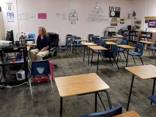 In this file photo, Dana Dyer teaches an online seventh grade algebra class from her empty