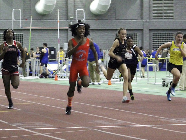 In this Feb. 7, 2019 file photo, Bloomfield High School transgender athlete Terry Miller, second from left, wins the final of the 55-meter dash over transgender athlete Andraya Yearwood, far left, and other runners in the Connecticut girls Class S indoor track meet at Hillhouse High School in New Haven, …