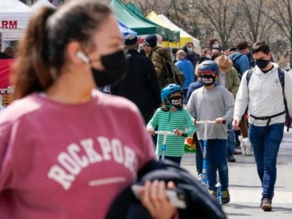 Shoppers at the Union Square farmers market wear masks to protect against the coronavirus,