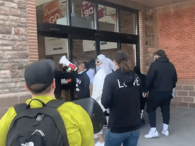 Black Lives Matter Protests attack a Wegmans grocery story in Rochester, NY, trapping more than 100 customers inside. (Twitter Video Screenshot/Rob Bell)