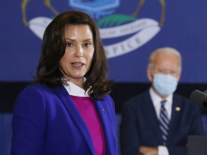 In this file photo, Gov. Gretchen Whitmer (L) introduces Democratic presidential nominee J