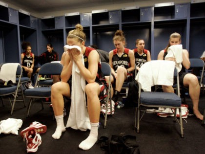 Stanford's JJ Hones towels off in the locker room after losing the national championship basketball game to Tennessee at the NCAA Women's Final Four Tuesday, April 8, 2008, in Tampa, Fla. (AP Photo/Amy Sancetta)
