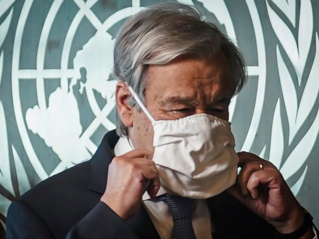 United Nations Secretary-General AntÃ³nio Guterres adjusts his face mask following an interview, Wednesday Oct. 21, 2020, at U.N. headquarters. (AP Photo/Bebeto Matthews)