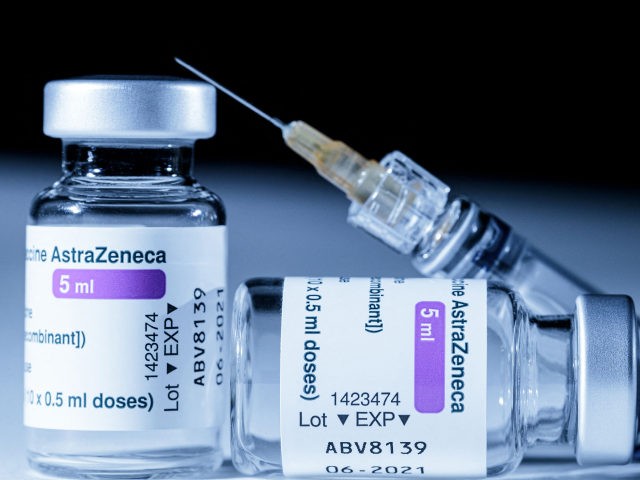 This picture shows vials of the AstraZeneca Covid-19 vaccine and a syringe in Paris on Mar
