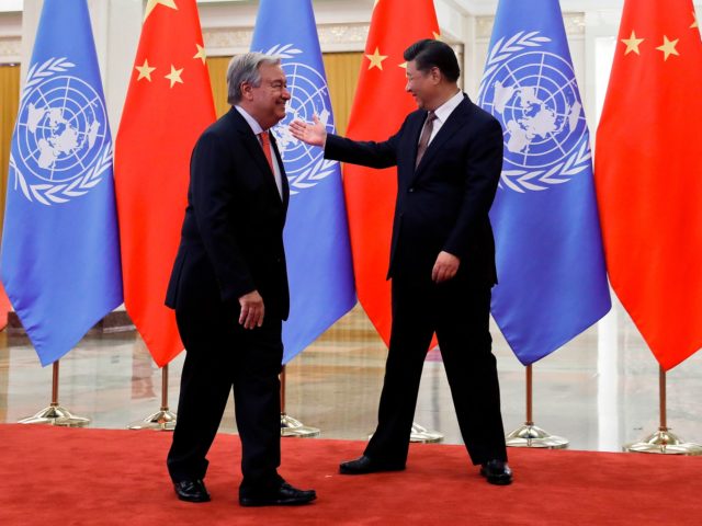 United Nations Secretary General Antonio Guterres (L) is welcomed by China's President Xi Jinping (R) before their bilateral meeting at the Great Hall of the People in Beijing on September 2, 2018. (Photo by Andy Wong / POOL / AFP) (Photo credit should read ANDY WONG/AFP via Getty Images)