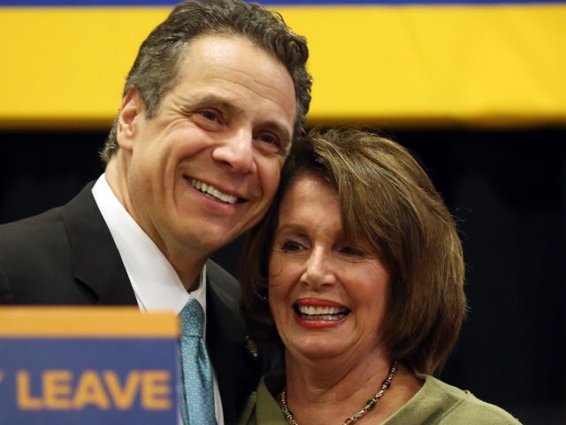 NEW YORK, NY - MARCH 10: Democratic leader Nancy Pelosi joins New York Governor Andrew Cuomo to promote the governor's paid family leave initiative at a rally in Manhattan Thursday morning on March 10, 2016 in New York City. The proposal, "Strong Families, Strong New York", calls for 12 weeks …
