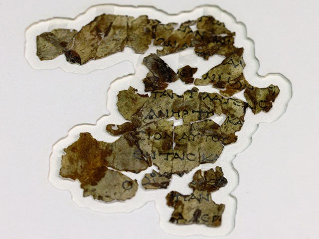 Recently-discovered 2000-year-old biblical scroll fragments from the Bar Kochba period, are displayed at the Israel Antiquities Authority's (IAA) Dead Sea conservation lab in Jerusalem, on March 16, 2021, after completion of preservation work. - Israel described the find, which includes a cache of rare coins, a six-millennia-old skeleton of a …