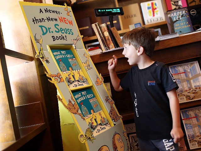 CORAL GABLES, FL - JULY 28: Sebastian Alonso, 6, looks at a display of Dr. Seuss' never-before-published book, "What Pet Should I Get?" on the day it is released for sale at the Books and Books store on July 28, 2015 in Coral Gables, United States. The manuscript by the …